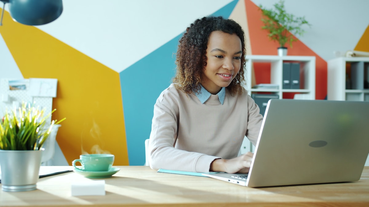A job seeker working on her laptop